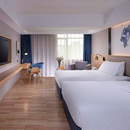 Kyriad Marvelous Hotel Dongguan Changan Light Rail Station Exterior foto